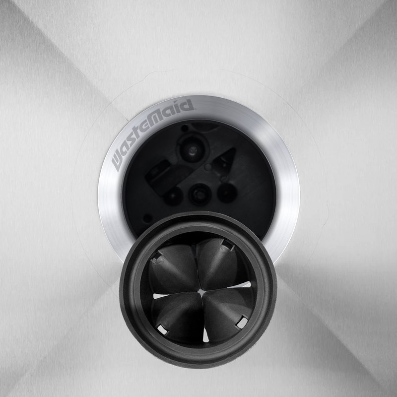 splash guard in stainless steel sink near drain