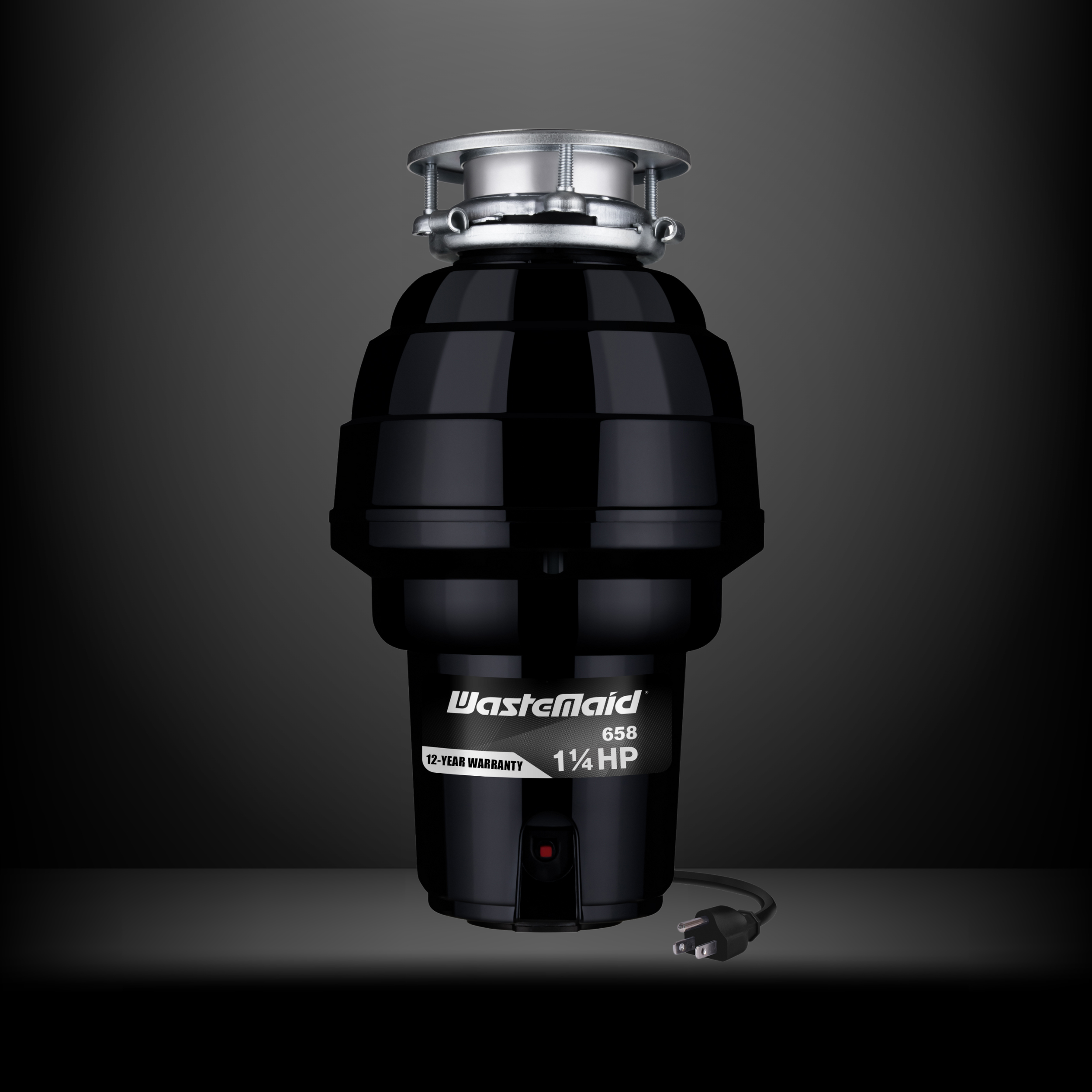 Black Wastemaid garbage disposal unit on a dark background