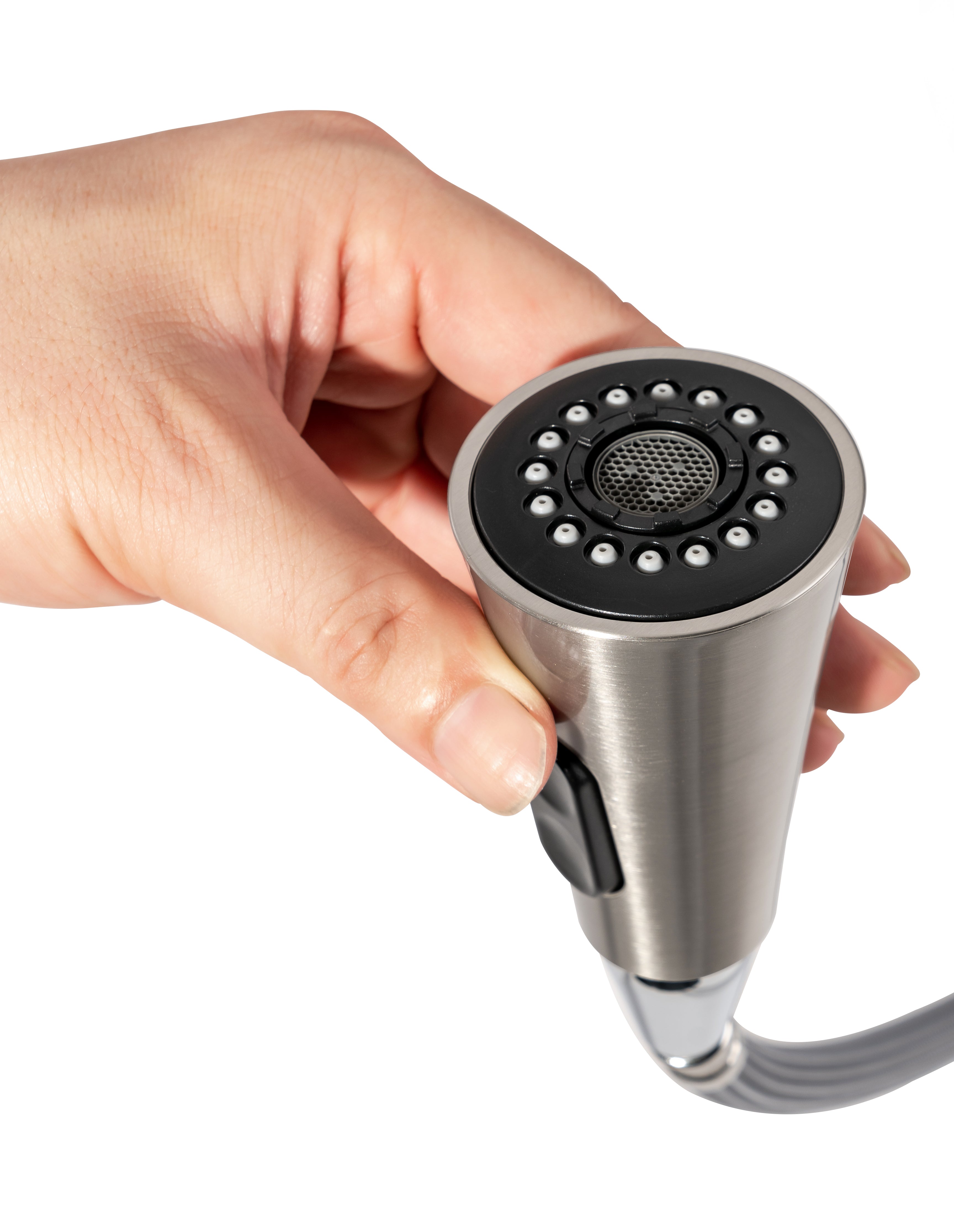 Hand holding a stainless steel kitchen faucet head against a white background