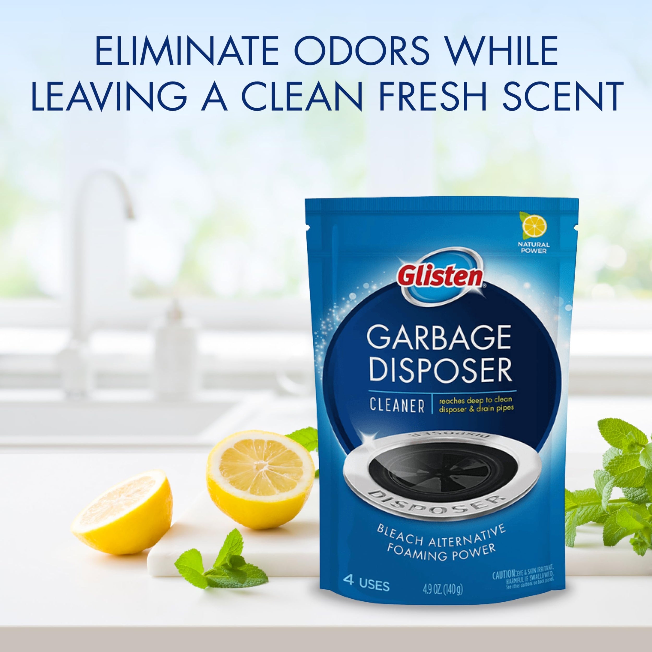 Disposal cleaner packet on kitchen countertop with cut lemons and leaves besides it.