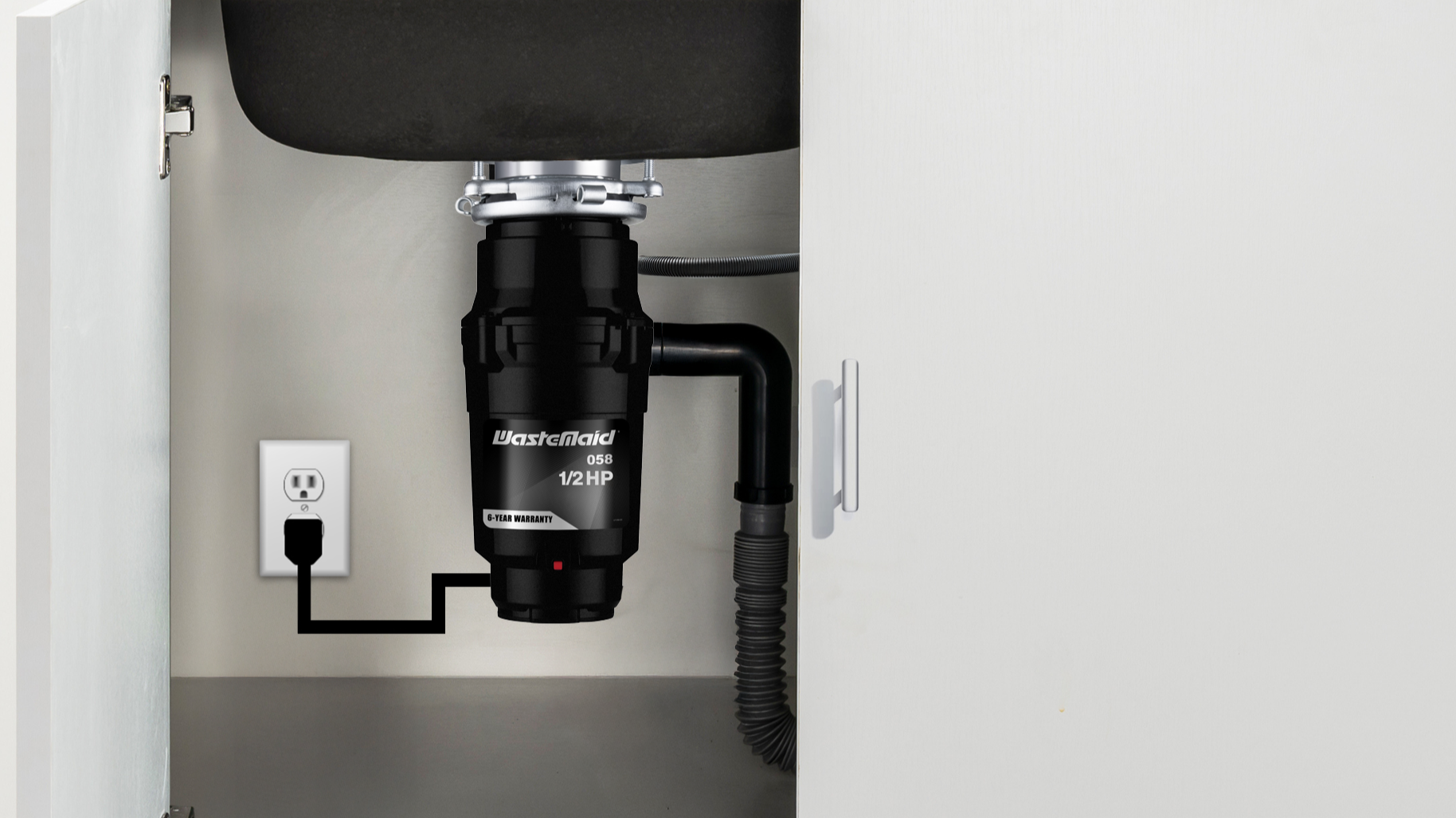 wastemaid disposal installed under sink with cabinet open