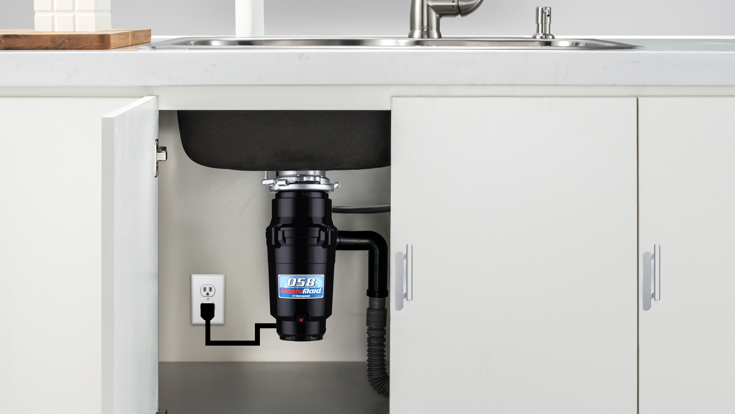Kitchen sink with open cabinet revealing a Disposer Unit underneath